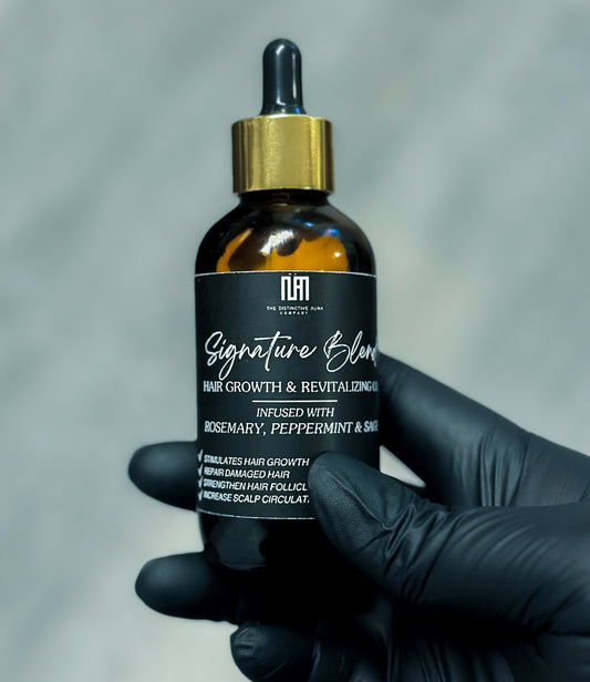 4oz bottle of Signature Blend Hair Growth & Revitalizer Oil